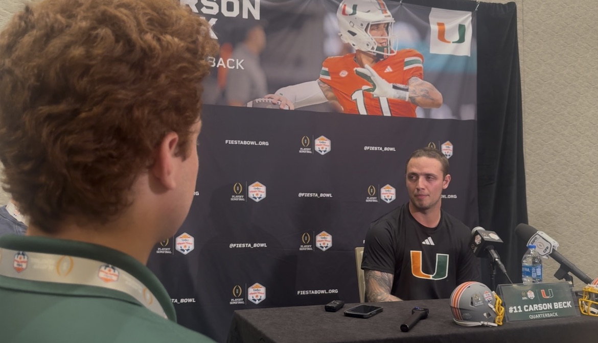 Carter Lutz interviewing Miami QB Carson Beck
