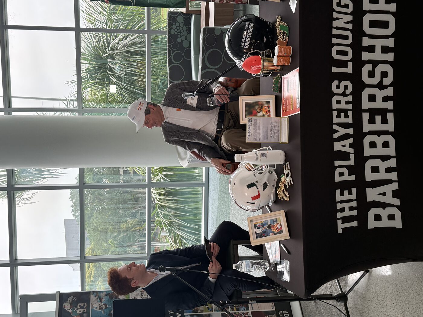Carter Lutz interviewing a guest at the conference